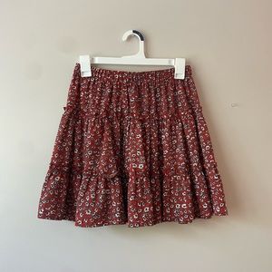 red floral skirt
